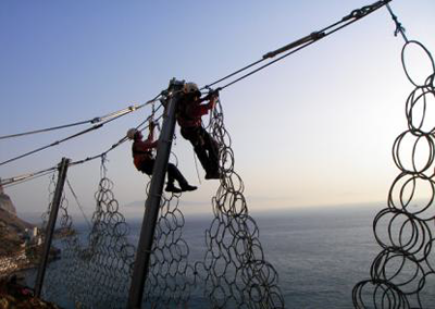 Rockfall geohazards, netting